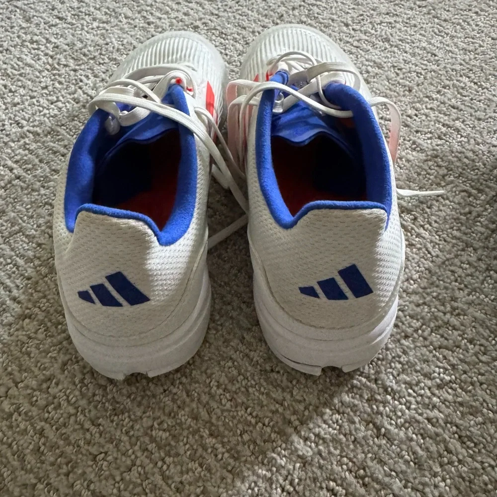 adidas White Athletic Shoes with Blue Lining and Pink Accents
